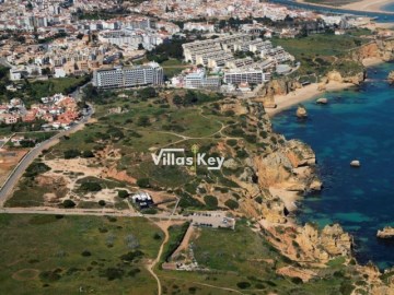 Land with project for a house next to Praia D. Ana